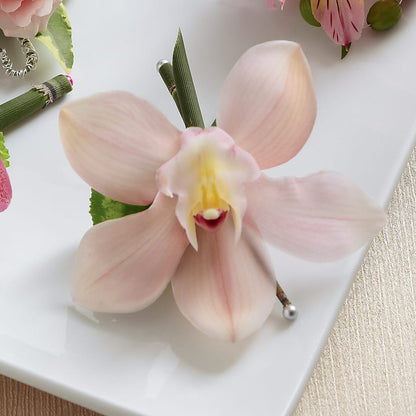 Pink Cymbidium Boutonniere – SUSPENDED IN TIME FLORAL & PRESERVATION, Syracuse UT